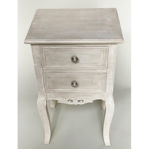 193 - BEDSIDE TABLES, a pair, French style grey painted each with two drawers and carved, pierced apron, 4... 