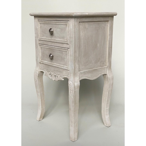 193 - BEDSIDE TABLES, a pair, French style grey painted each with two drawers and carved, pierced apron, 4... 