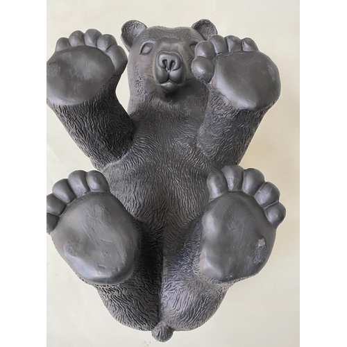 291 - BROWN BEAR LOW TABLE, oval bevelled glass on resin moulded base, 107cm x 66cm x 42cm H.