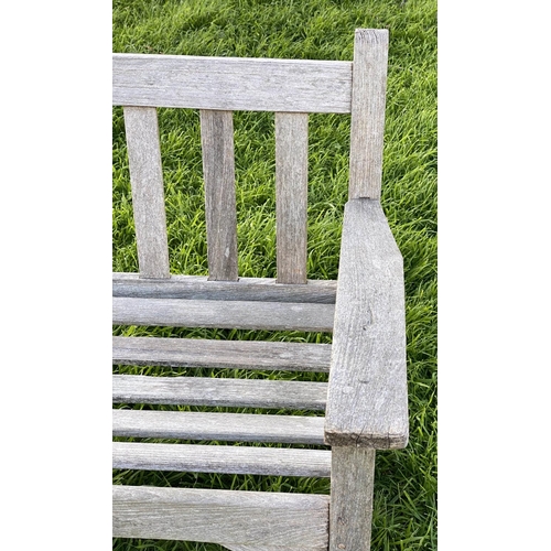 294 - GARDEN BENCH, weathered teak English country house style with slatted back, 157cm W.