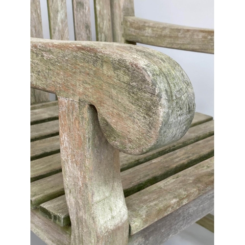 295 - GARDEN ARMCHAIRS, a pair, weathered teak and slatted with flat top arms, 68cm W. (2)