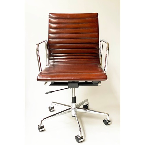 196 - REVOLVING DESK CHAIR, Charles and Ray Eames inspired with ribbed tan leather seat revolving and reta... 