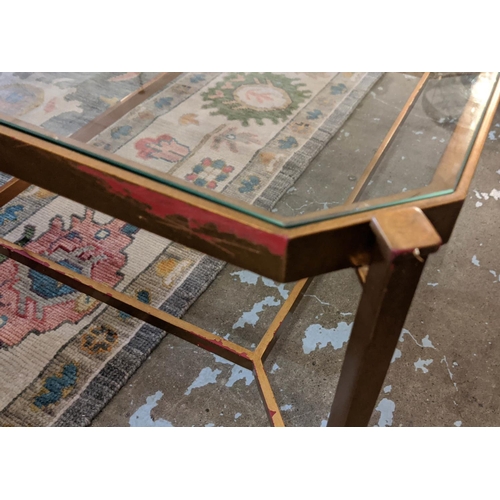 446 - OKA COCKTAIL TABLE, 121cm W x 88cm x 52cm H, glass top on a Champagne gilt metal base.