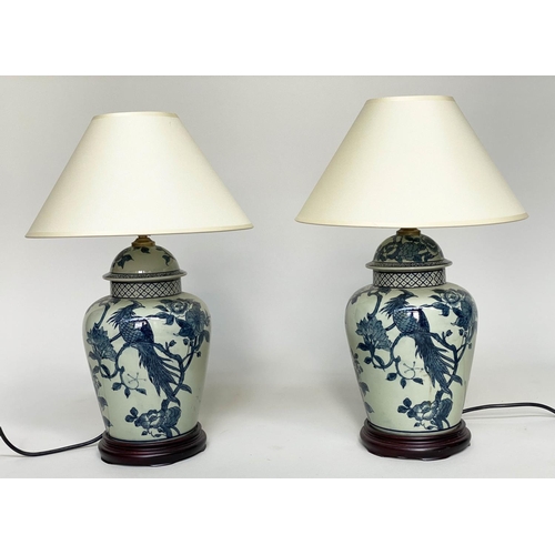 237 - TABLE LAMPS, a pair, Chinese blue and white ceramic of ginger jar form depicting birds of paradise, ... 