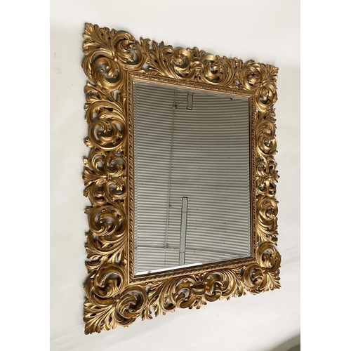 241 - WALL MIRROR, Italian Florentine style giltwood and gesso with broad pierced foliate frame and bevell... 