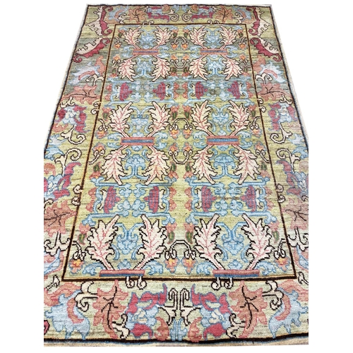123 - ARTS AND CRAFTS DESIGN CARPET, 290cm x 187cm.