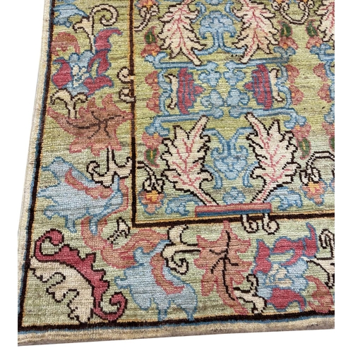 123 - ARTS AND CRAFTS DESIGN CARPET, 290cm x 187cm.