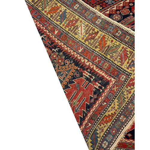 125 - ANTIQUE CAUCASIAN CORRIDOR CARPET, 332cm x 138cm.