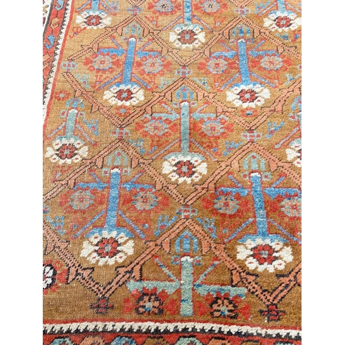 126 - ANTIQUE PERSIAN BAKSHAISH RUNNER, 390cm x 99cm.