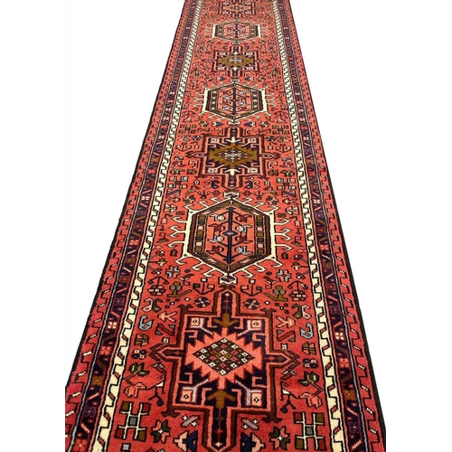 127 - PERSIAN KARAJA LONG RUNNER, 480cm x 77cm.
