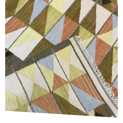130 - CONTEMPORARY SWEDISH DESIGN KILIM, 302cm x 184cm.