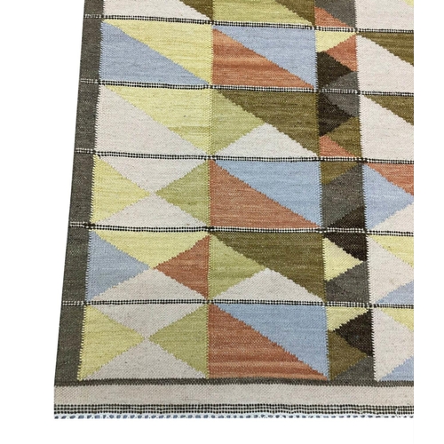 130 - CONTEMPORARY SWEDISH DESIGN KILIM, 302cm x 184cm.