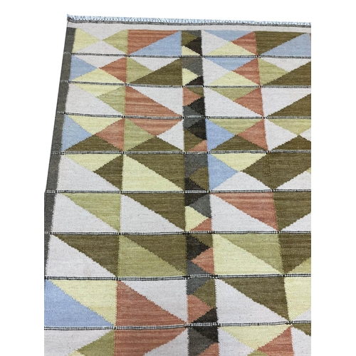 130 - CONTEMPORARY SWEDISH DESIGN KILIM, 302cm x 184cm.