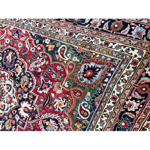 133 - ANTIQUE PERSIAN CARPET, 337cm x 267cm.