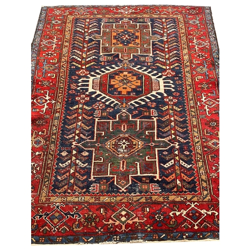 136 - ANTIQUE PERSIAN HERIZ RUG, 190cm x 142cm.
