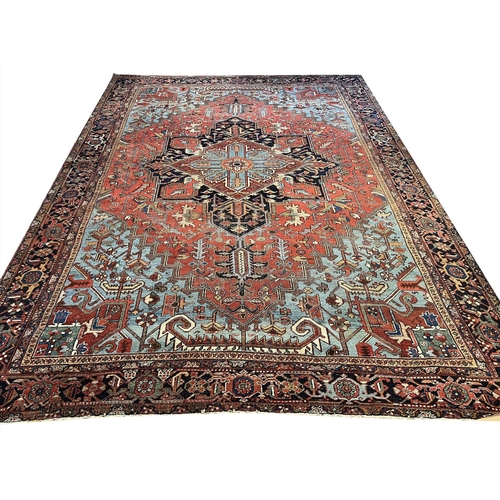 140 - ANTIQUE PERSIAN HERIZ CARPET, 400cm x 293cm.