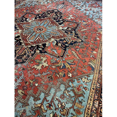 140 - ANTIQUE PERSIAN HERIZ CARPET, 400cm x 293cm.