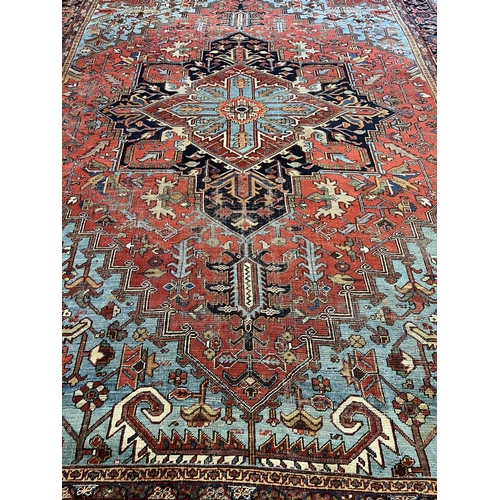 140 - ANTIQUE PERSIAN HERIZ CARPET, 400cm x 293cm.