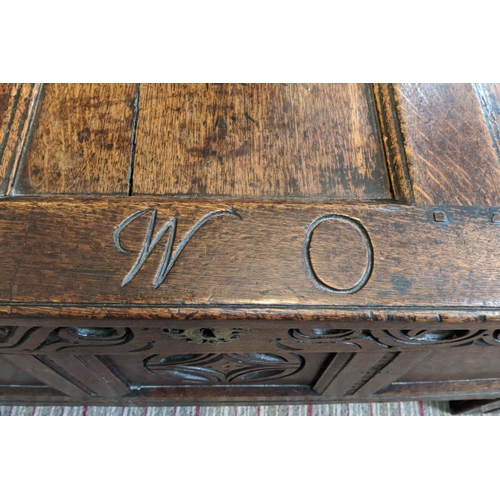 152 - 17TH CENTURY OAK COFFER, jointed construction, original carved frieze and central panel, initialled ... 