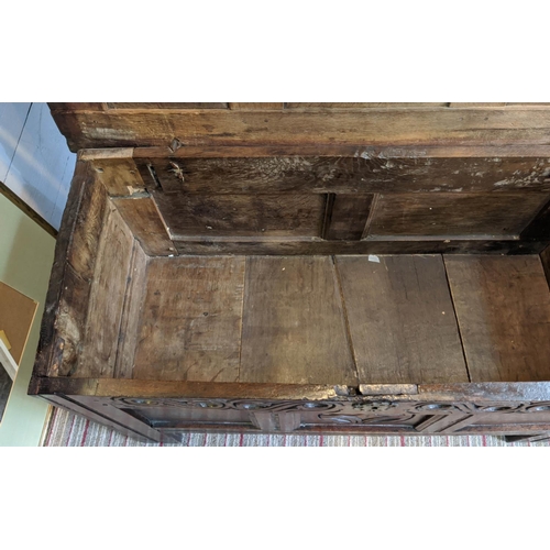 152 - 17TH CENTURY OAK COFFER, jointed construction, original carved frieze and central panel, initialled ... 