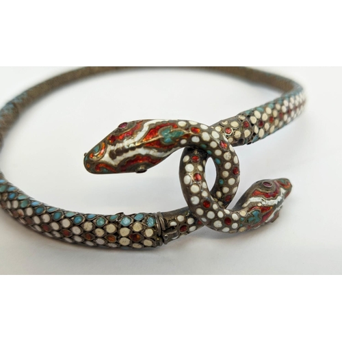 19 - A STERLING SILVER AND ENAMEL CHOKER SNAKE NECKLACE, with garnet eyes, plus a silver serpent, snake n... 