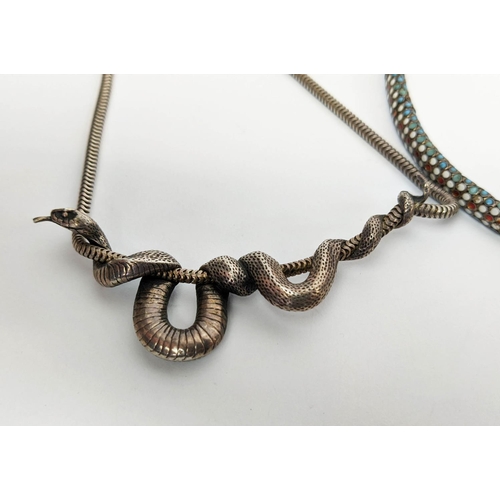 19 - A STERLING SILVER AND ENAMEL CHOKER SNAKE NECKLACE, with garnet eyes, plus a silver serpent, snake n... 