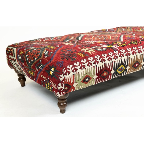 221 - KILIM FOOTSTOOL, Anatolian kilim upholstered with turned supports, 35cm H x 137cm x 69cm.