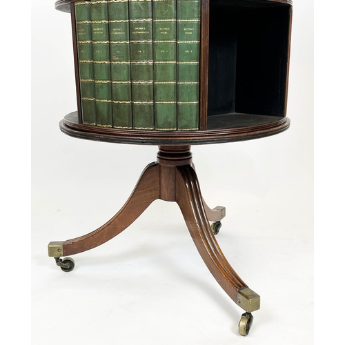 298 - REVOLVING BOOKCASE, 96cm H x 60cm, Regency mahogany with leather faux bookspines on brass castors.