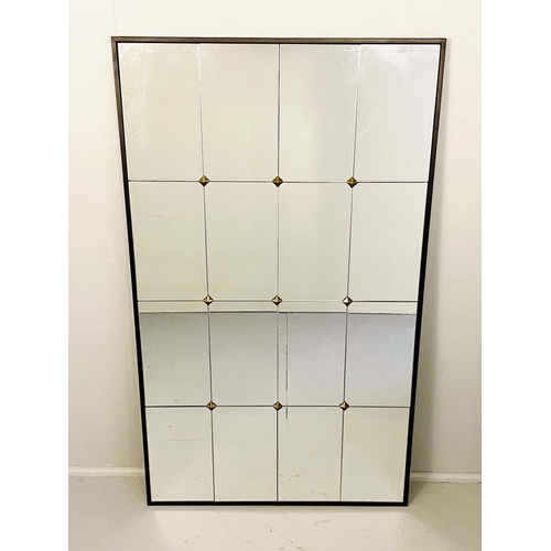 543 - ARCHITECTURAL WALL MIRROR, segmented plate in black frame, gilt stud detail, 120cm x 70cm.