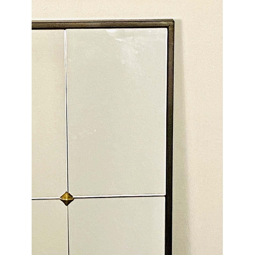 543 - ARCHITECTURAL WALL MIRROR, segmented plate in black frame, gilt stud detail, 120cm x 70cm.