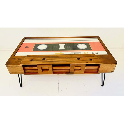 545 - LOW TABLE, 40cm high x 110cm wide x 60cm deep, cassette tape design, with storage to one side.