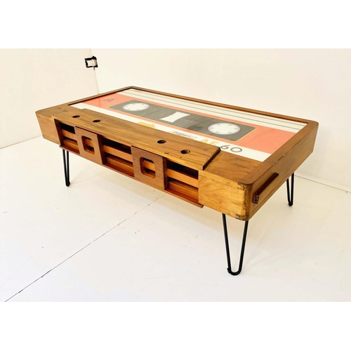 545 - LOW TABLE, 40cm high x 110cm wide x 60cm deep, cassette tape design, with storage to one side.