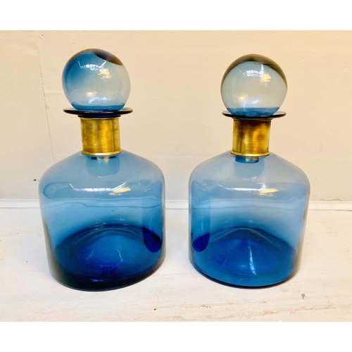 566 - DECANTERS, a pair, 38cm high x 22cm diameter, Murano style, glass, gilt metal collars. (2)