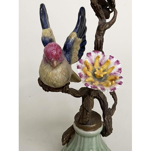 365 - CANDLESTICKS, a pair, Continental style painted porcelain and gilt metal mounted modelled as finches... 