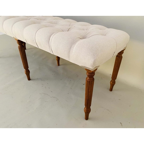 521 - HALL SEAT, 51cm H x 122cm W x 44cm D, deep buttoned neutral upholstery, raised on turned legs.