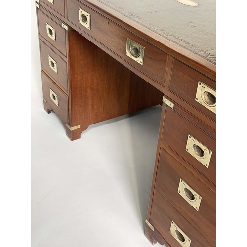 108 - CAMPAIGN STYLE DESK, 1970s mahogany and brass bound with tooled leather writing surface, twin pedest... 