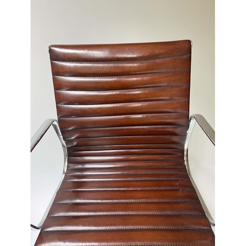 109 - REVOLVING DESK CHAIR, Charles and Ray Eames inspired with ribbed tan leather seat revolving and recl... 