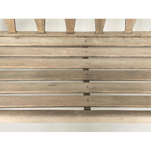 129 - GARDEN BENCH, weathered teak of slatted construction with triangular splat back, 140cm W.