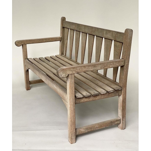 129 - GARDEN BENCH, weathered teak of slatted construction with triangular splat back, 140cm W.