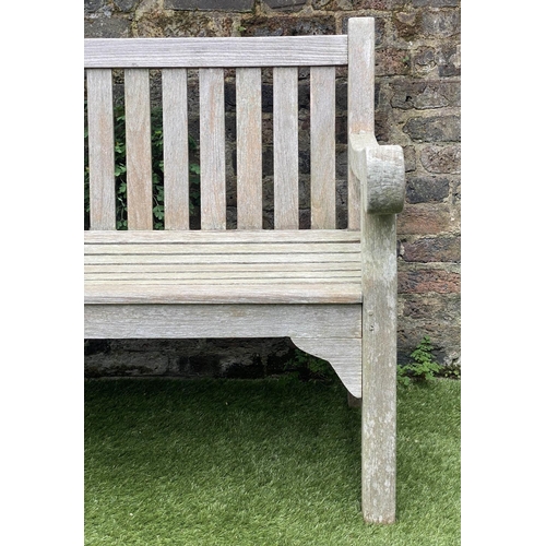 131 - GARDEN BENCH, weathered teak of large size and substantial slatted construction, 180cm W.