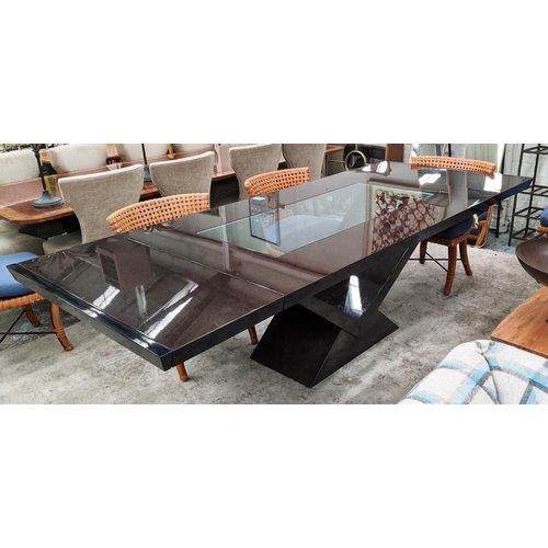 304 - DINING TABLE, extendable with two leaves, central glass panel, 273cm x 110cm x 77 at largest.