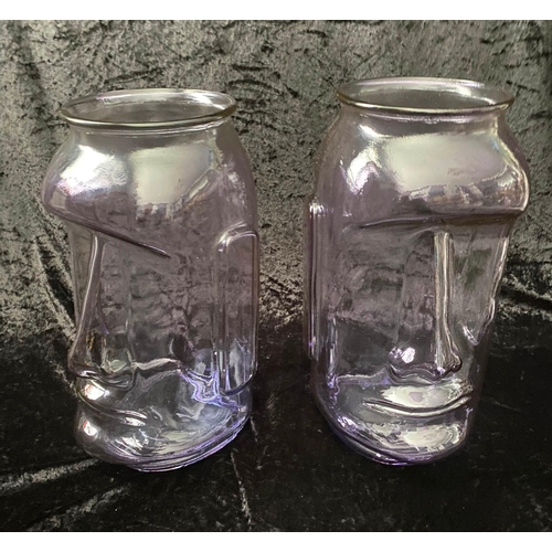 390 - RAPS NUI STYLE VASES, a set of four, two in lilac tinted glass, and two in green tinted glass, 35cm ... 