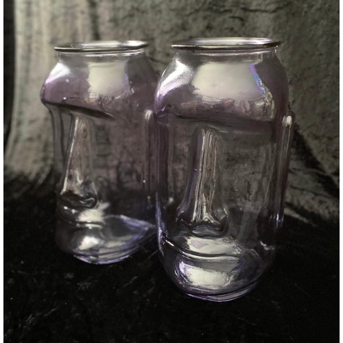 390 - RAPS NUI STYLE VASES, a set of four, two in lilac tinted glass, and two in green tinted glass, 35cm ... 