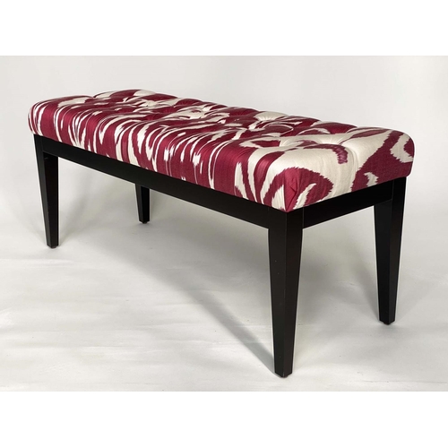 397 - WINDOW SEAT, batik style crimson and buttoned upholstery, 111cm W.