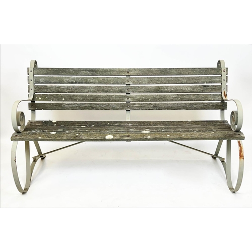 578 - GARDEN BENCH, wrought iron strap work frame with weathered teak slats, 157cm W.