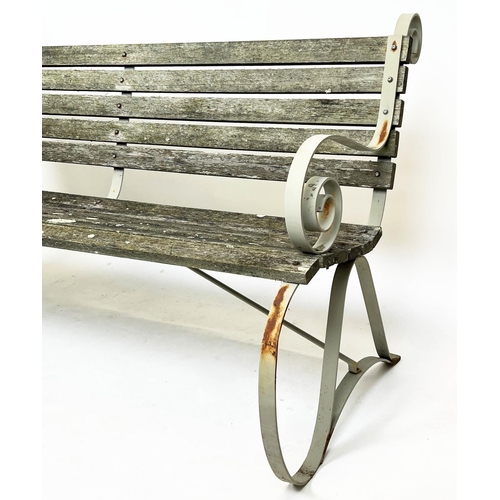 578 - GARDEN BENCH, wrought iron strap work frame with weathered teak slats, 157cm W.