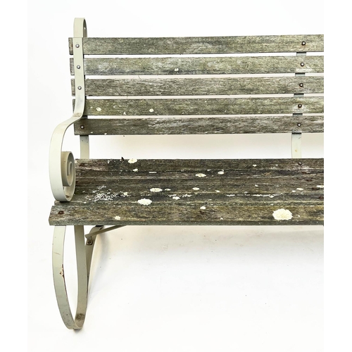 578 - GARDEN BENCH, wrought iron strap work frame with weathered teak slats, 157cm W.