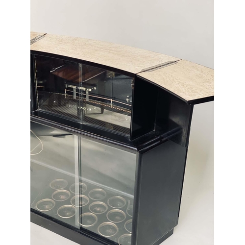174 - CHINOISERIE BAR, 1930s black lacquered and polychrome gilt decorated with two parts of panelled door... 