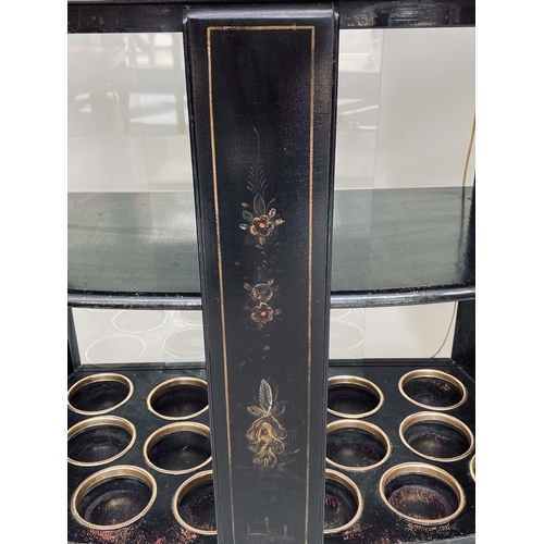 174 - CHINOISERIE BAR, 1930s black lacquered and polychrome gilt decorated with two parts of panelled door... 