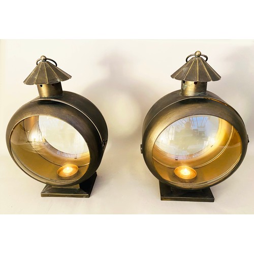 517 - LANTERNS, a pair, 54cm high x 37cm wide x 26cm deep, nautical style, antiqued gilt metal finish. (2)